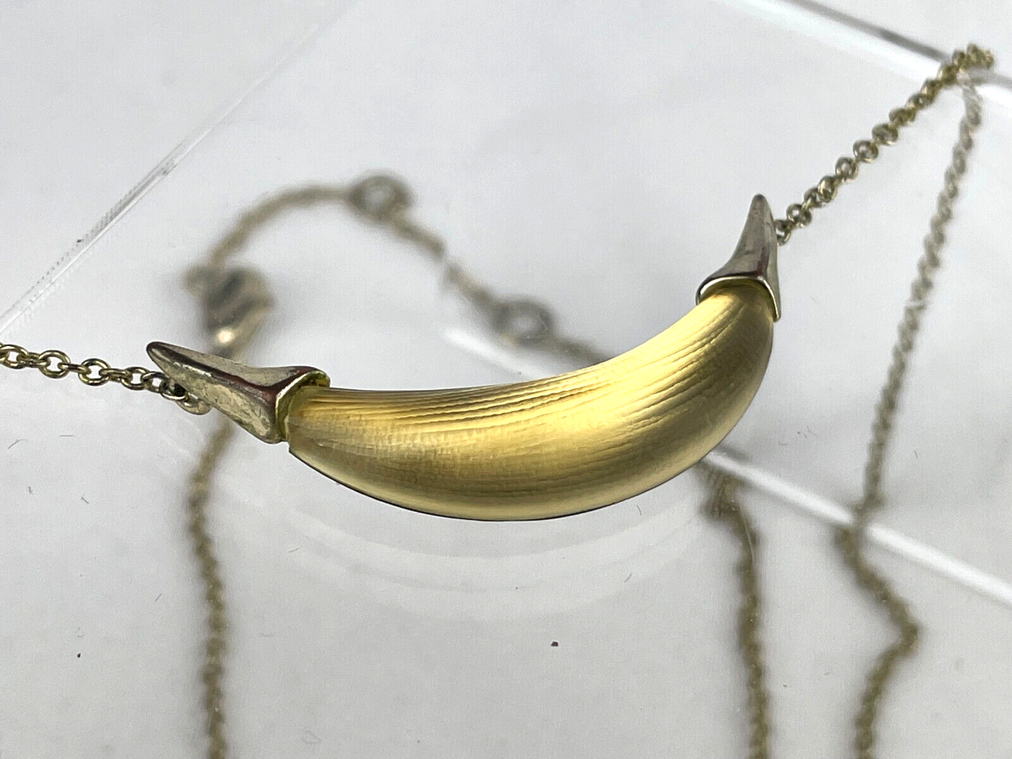 Alexis Bittar Goldtone Capped Lucite Crescent Shaped Gold/Yellow Necklace